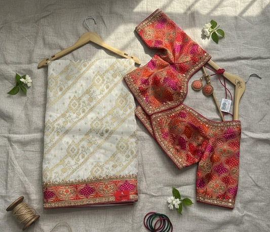 Radiant Ivory Saree with Multi-Hued Bandhani-Style Embroidered Blouse