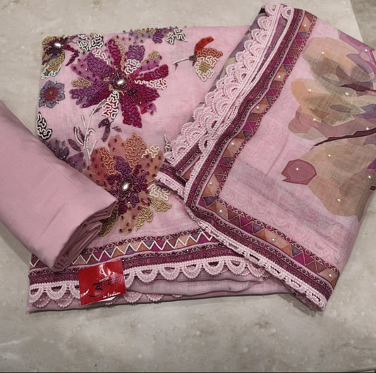 Floral-patterned fabric on a marble surface with a blurred background